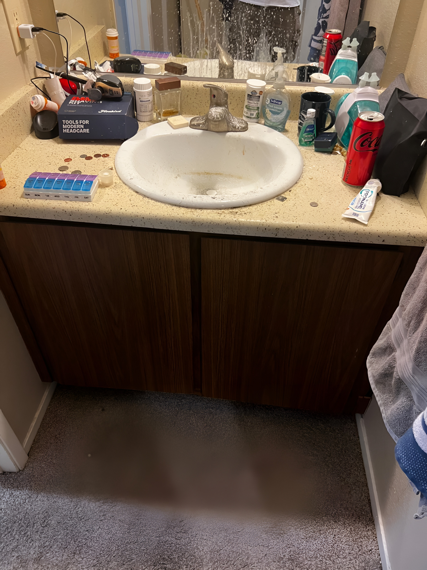 Bathroom vanity before cleaning in Reno NV