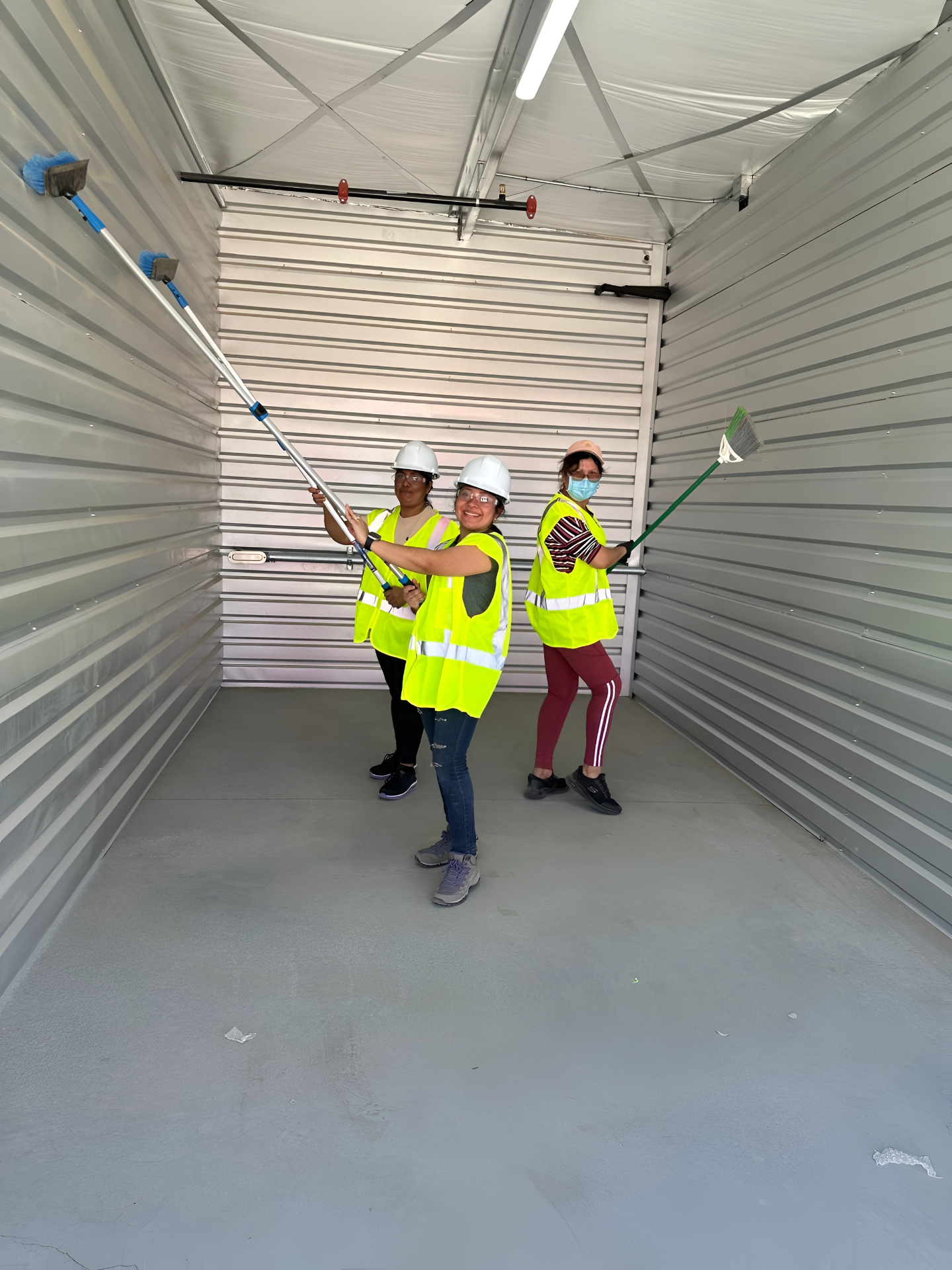 Cleaning crew in safety vests at storage facility in Reno NV