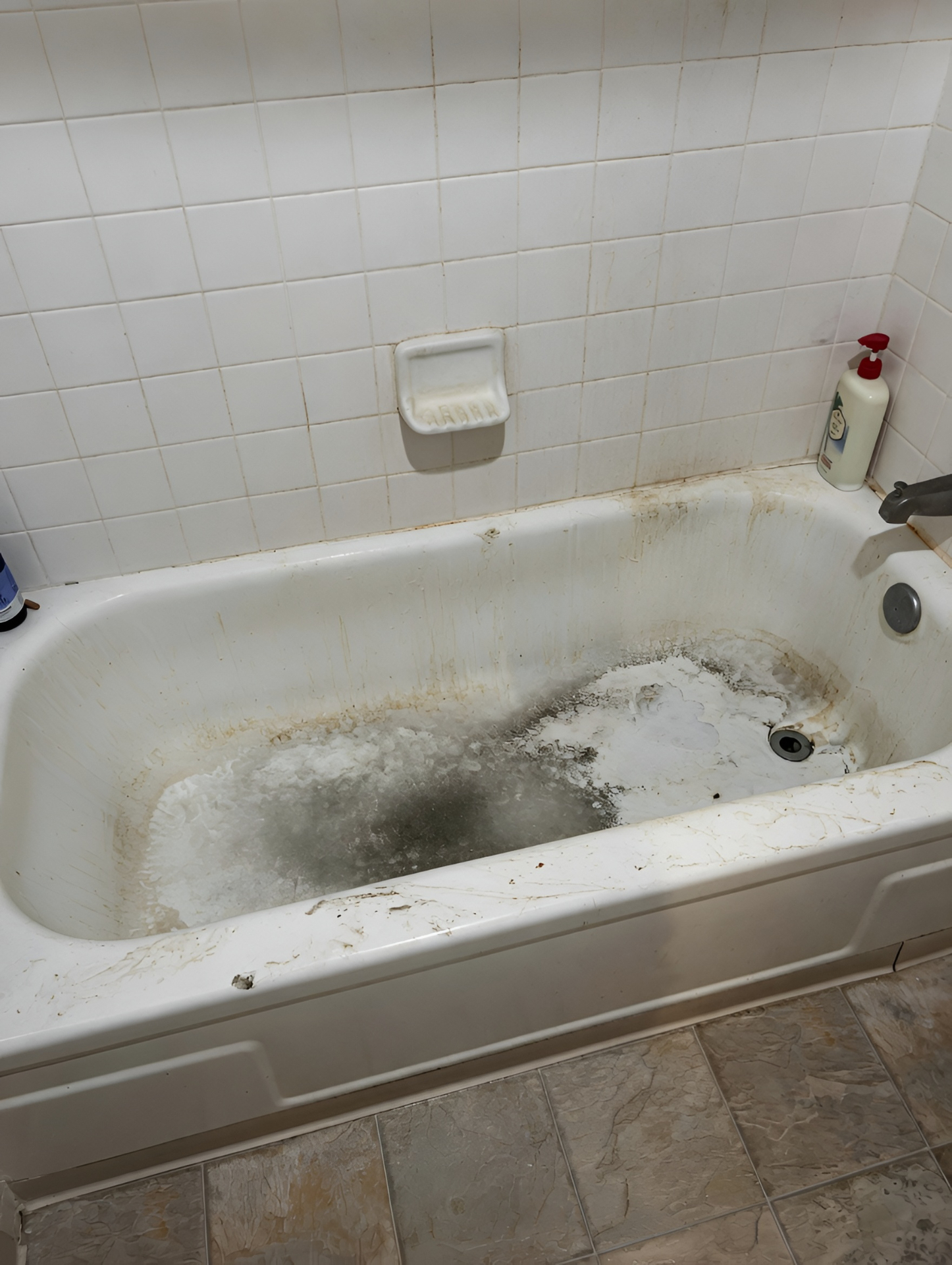 Bathtub before deep cleaning in Reno NV